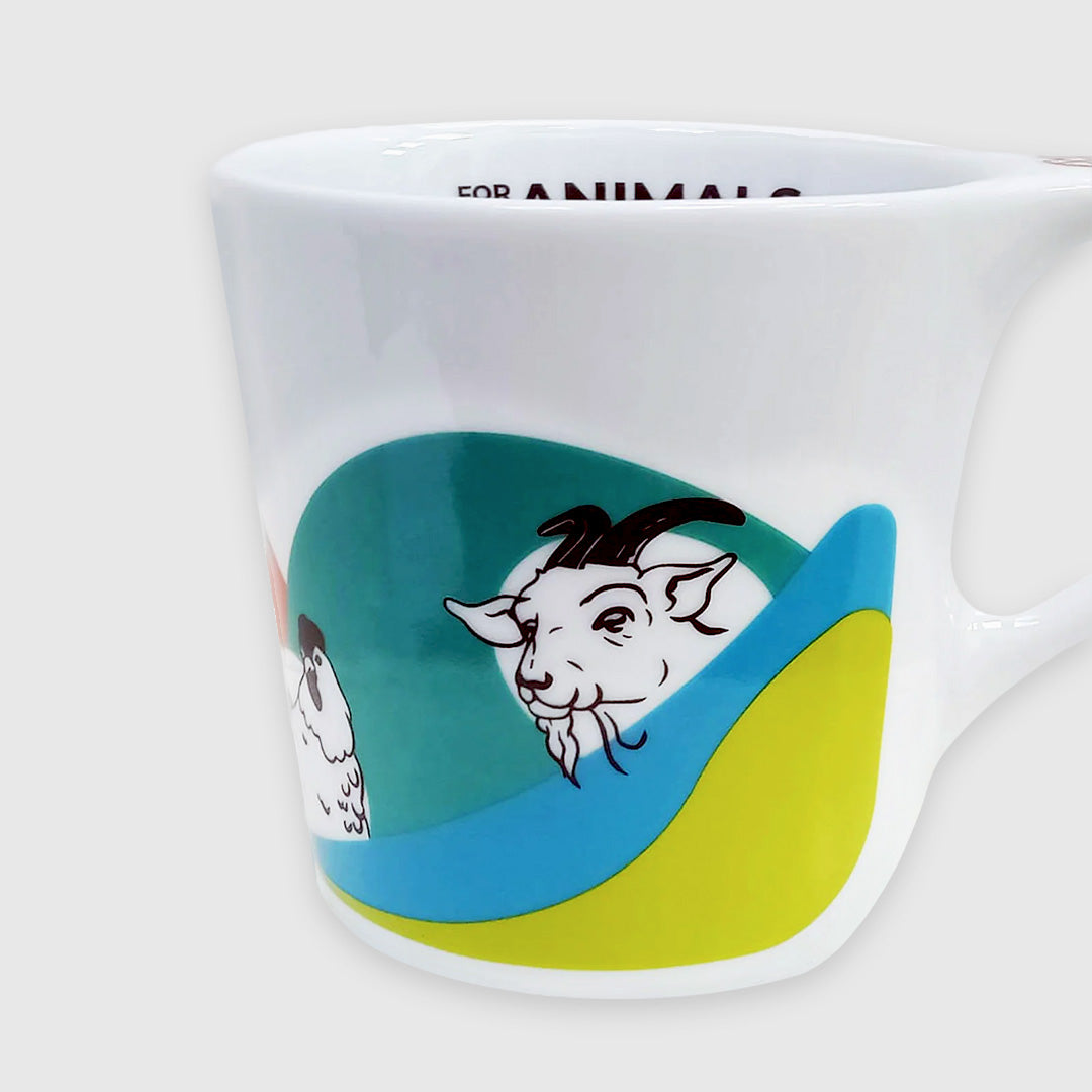 Mug with the handle facing the right so an illustrated image of a goat is facing forward. A chicken illustration is visible on the left side in this view. Colorful bands flow under and around the animal heads. The animals featured on the face of the mug going from left to right are: cow, pig, chicken, goat.