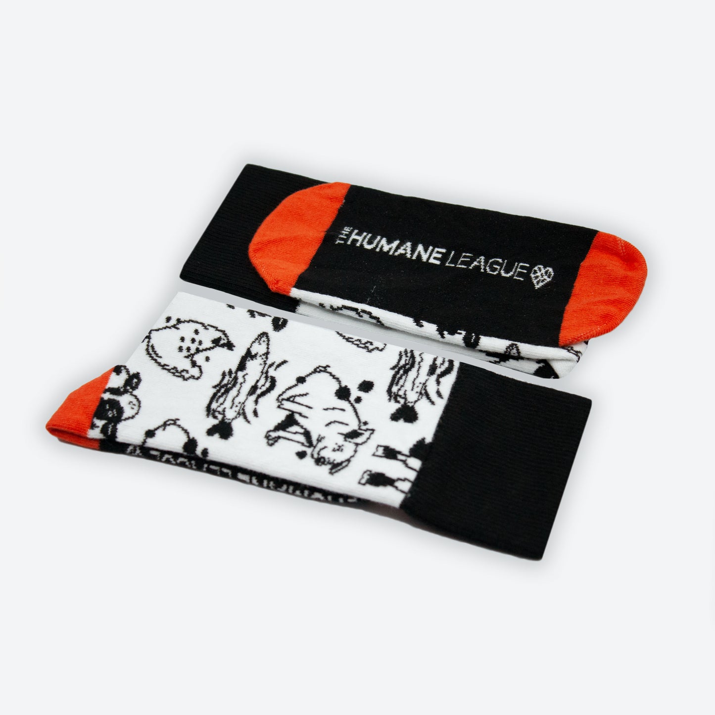 Folded pair of socks showing the logo on the bottom of the foot.