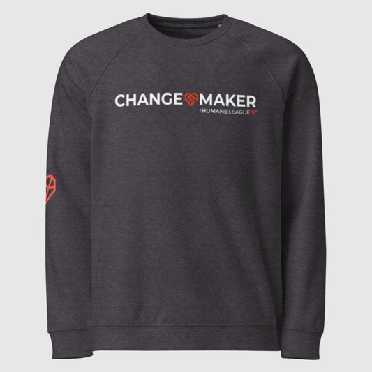 A dark grey heather sweatshirt with long sleeves. The front says Changemaker in white. A Mended Heart is in between the words Change and Maker. "The Humane League" and red geometric heart are printed underneath.