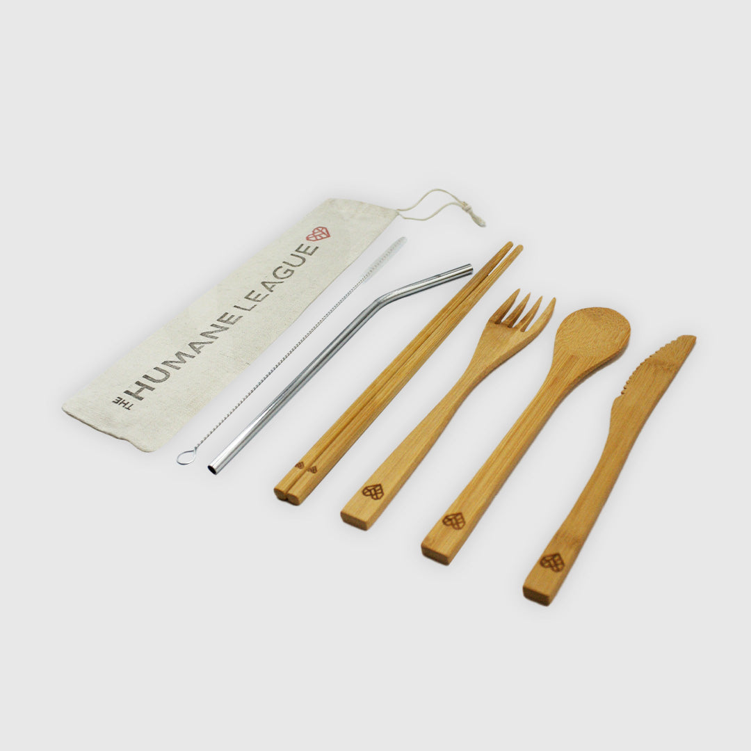 The bamboo fork, knife, spoon, chopsticks feature a geometric heart burned into the end of each utensil. The metal straw has the same heart design engraved toward the top of the straw.