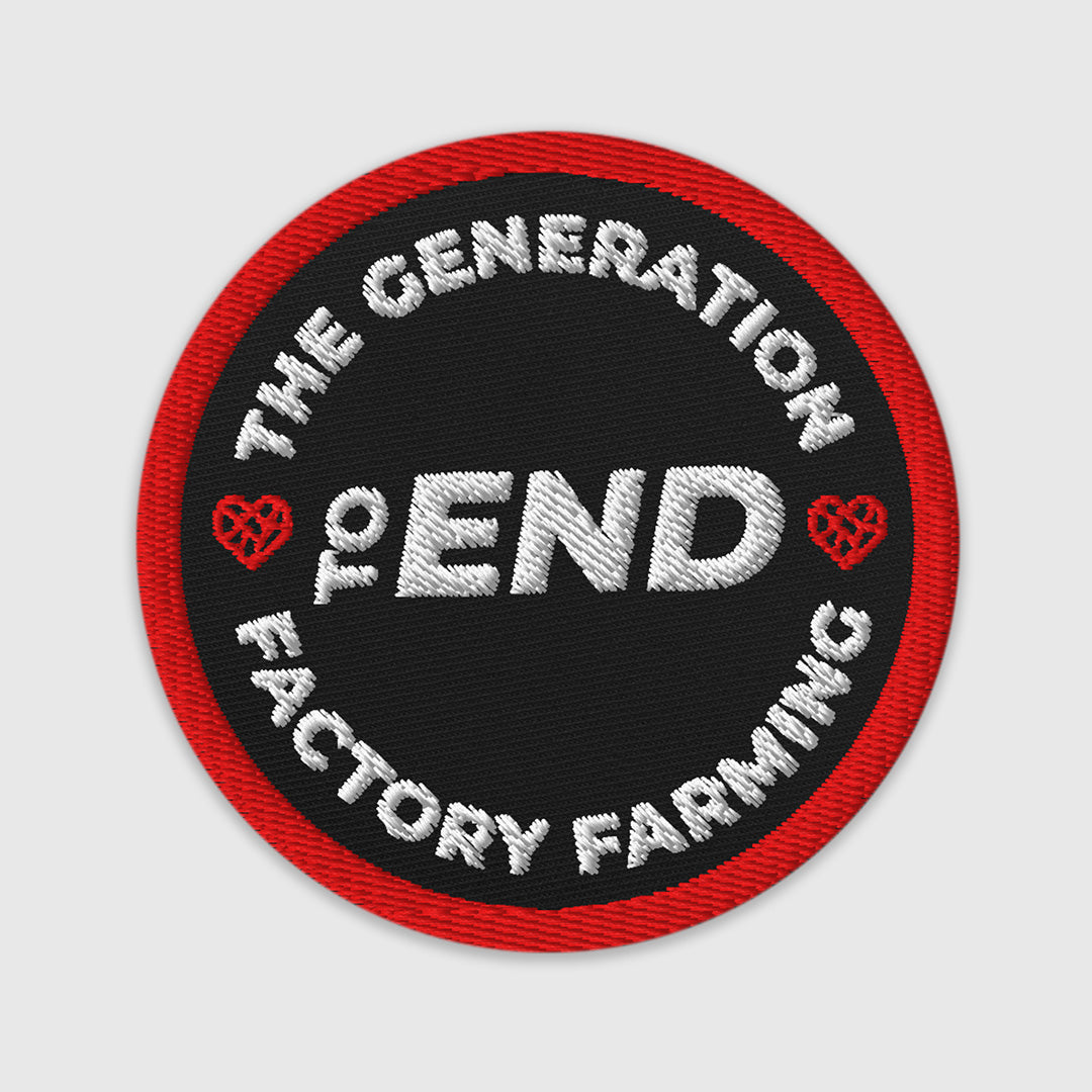 Round patch with white text 'The Generation to End Factory Farming' on a black background with red border.