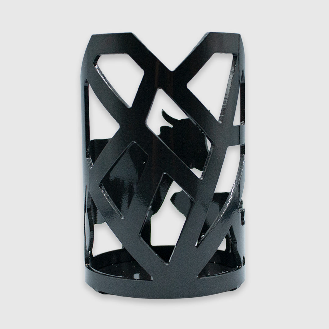 Black metal candle holder with cow, pig, chicken, and Mended Heart cut outs.