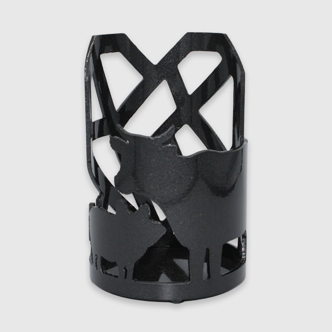 Black metal candle holder with cow, pig, chicken, and Mended Heart cut outs.