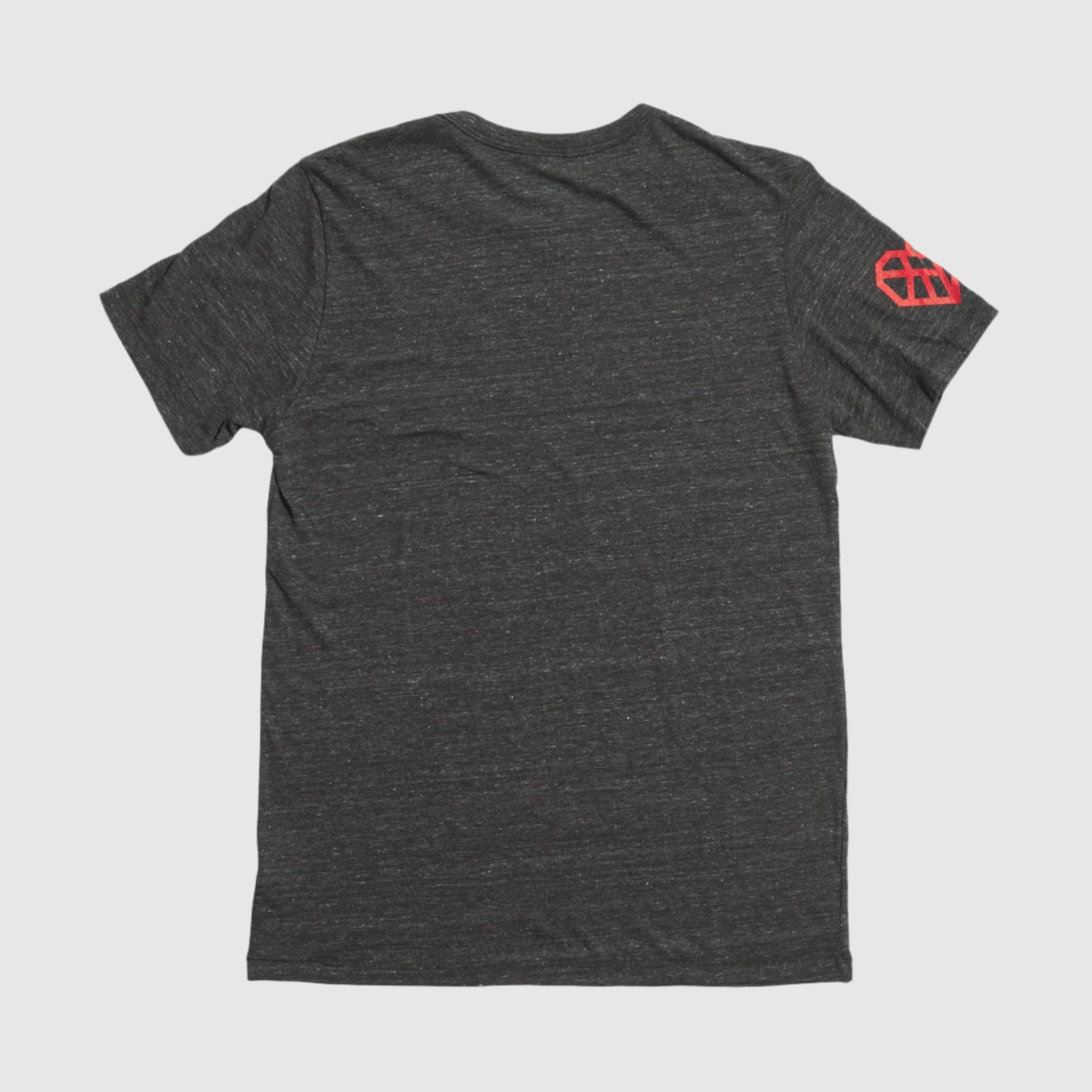 Back of the dark gray t-shirt showing the red geometric heart printed on the wearer's right sleeve. 