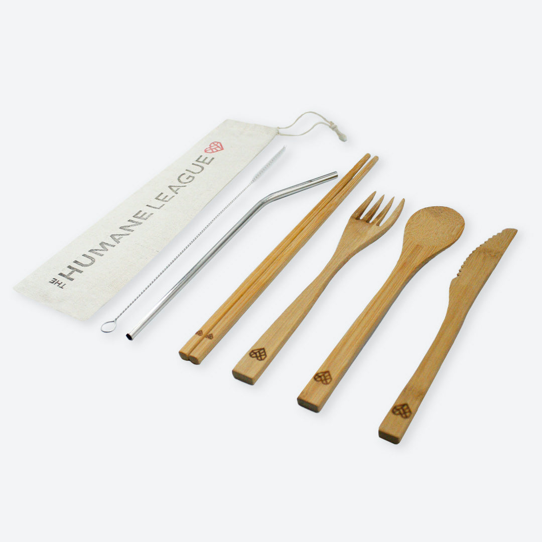 The bamboo fork, knife, spoon, chopsticks feature a geometric heart burned into the end of each utensil. The metal straw has the same heart design engraved toward the top of the straw.