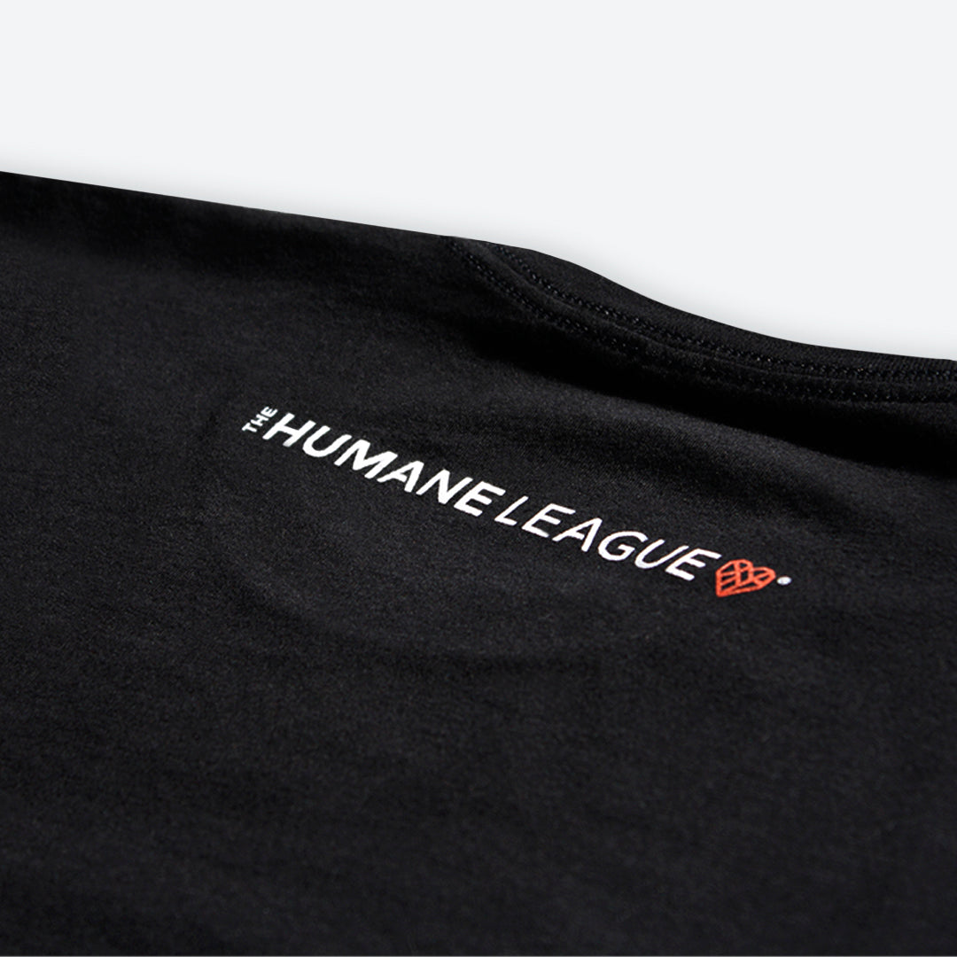 Close up of the logo on the back of the t-shirt